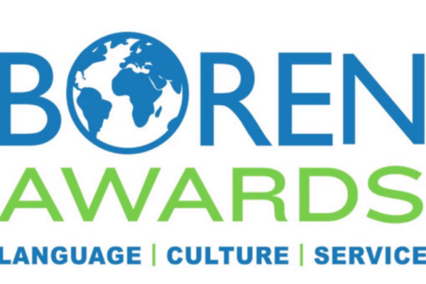 The Boren Awards logo. The word "BOREN" is in blue letters, with a globe icon in the middle of the "O". The word "AWARDS" is in green letters below "BOREN". The words "LANGUAGE | CULTURE | SERVICE" are in smaller, blue letters below "AWARDS".